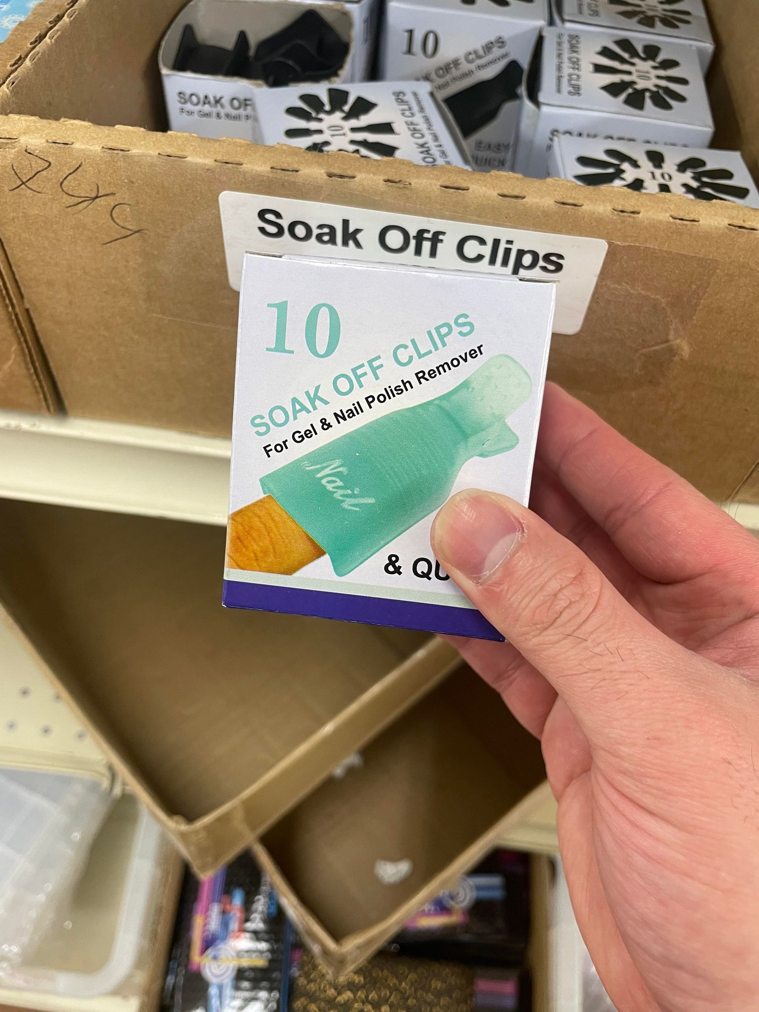 Reuseable soak off clip